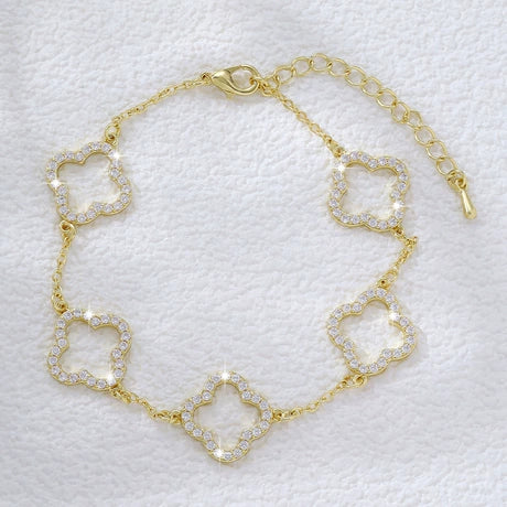 Cross-border wholesale: New micro-set cubic zirconia openwork four-leaf clover bracelet for women—a hot-selling Euro-American style accessory featuring a Japanese-Korean inspired floral design.