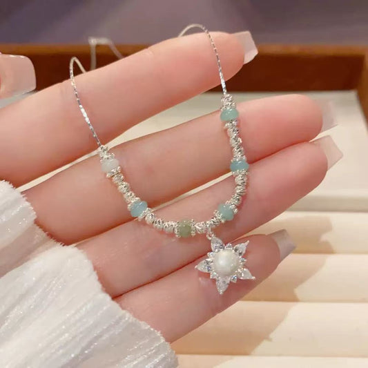Chic, minimalist, and stylish chunky silver beaded star necklace for women—a fresh, elegant, and trendy piece designed to sit at the collarbone.